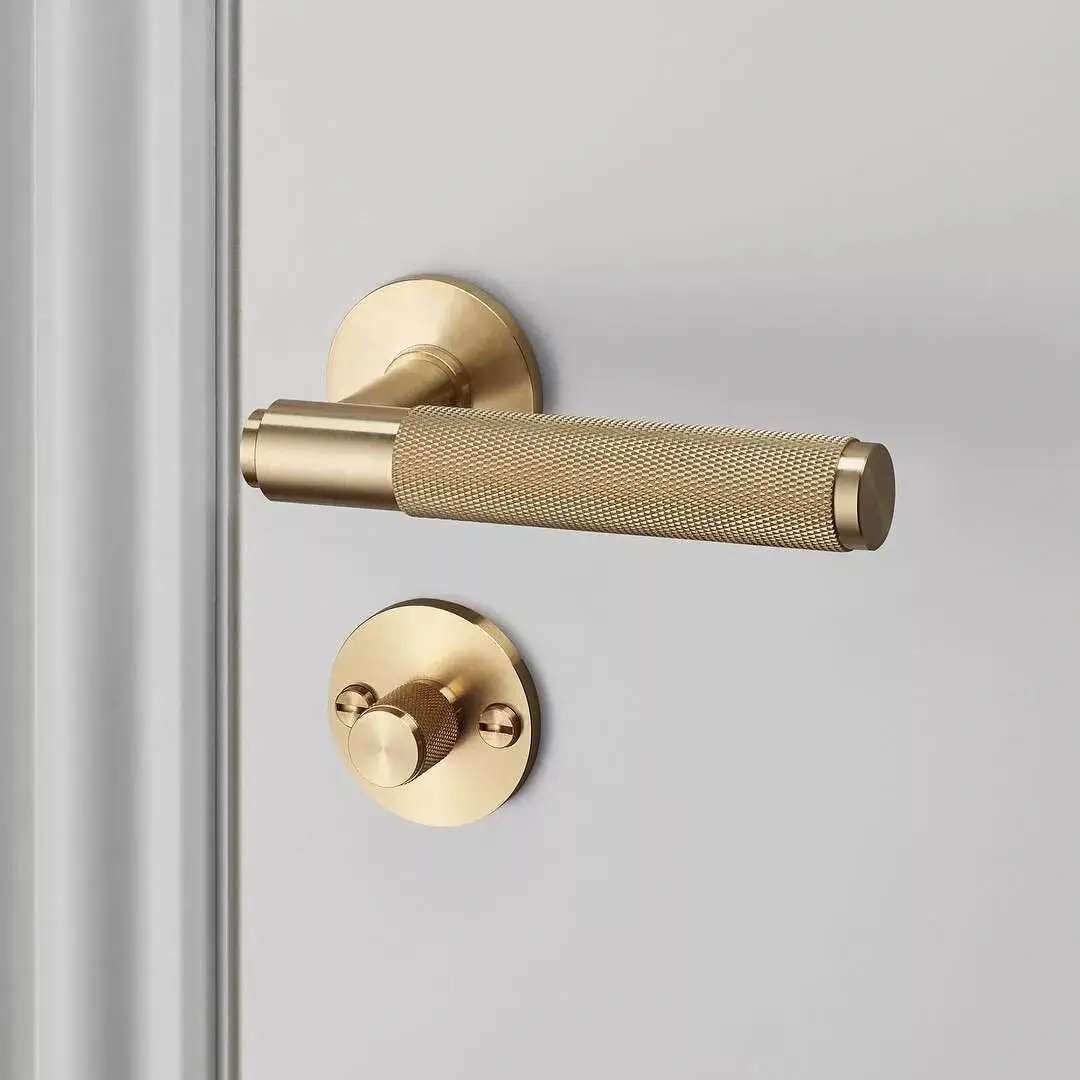 Close-up texture of brushed brass material.