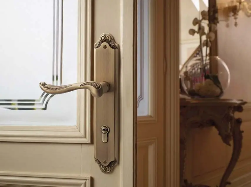 Designers discussing plans over a table.